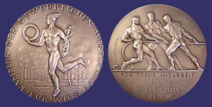 Fr Treue Mitarbeit, Silvered Bronze, 70 mm, Awarded 1974
[b]From the collection of John Birks[/b]

Awarded to:  Herrn Ing. Oskar Schaffek, Wien, 1974

This medal was designed by Edwin Grienauer for the "Kammer Der Gewerblichen Wirtschaft" (Chamber of the Commercial Economy of Vienna).  Edwin Grienauer was one of the more important Viennese Sculptors and Medalist of the 20th Century.  He was born March 7th, 1893 and by 1912, at age 19, he was already creating his first portrait plaques.  His body of work spans more than half a century.  Grienauer worked almost exclusively from commission and was proficient in all areas of sculptural design.  He died on August 21st, 1964.

These medals were issued over many years, exist in different sizes and metal compositions and have individualized dedications located below the three men on the reverse.  They were awarded for lengthy terms of service.

The obverse depicts Mercury carrying  a caduceus and a wreath.  In the background are the smoke stacks of industry at a riverside (Vienna is divided by the Danube River).  Across the bottom is inscribed "Fr Wien" and around the rim, "Kammer Der Gewerblichen Wirtschaft" (Chamber of the Commercial Economy of Vienna).  The reverse depicts three men in a classical style cooperating in pulling a load.   Below the image is the inscription "Fr Treue Mitarbeit" (For Loyal Dedication) "Frau Edeltraud Knapp Wien 1965" (Mrs. Edeltraud Knapp, Vienna 1958).

The medal work of Grienauers consists mainly of commissioned pieces for his customers and this aspect of his work is dominated by award/service medals of national or economic institutions and prizes for sporting events.  His large sculptures are still present today in Vienna and include reliefs and architectural sculptures, crucifixes and religious statues on and in Viennese churches, and even floor tiles for the St Stephans Cathedral.

Works include coinage dies of the Austrian 1st and 2nd Republic, medals, sculptures, and portraits.  He designed commemorative and regular issue coins for Liechtenstein as well.  Grienauer designed the denomination side of the last of the Schilling coins of Austria, which were in circulation from 1959 to 2002.

Keywords: nude male Edwin Grienauer