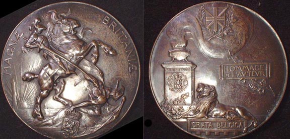 1839 Treaty of London
Recognition of Belgian Independence.

 Obv. George slaying the Dragon which holds the broken shield of Belgium . MAGNAI BRITANAE
Rev. British Arms oversees the protective Belgian Lion. GRATA BELGIA

Coated Bronze 66gms 60mm. by Josue Dupon minted by Fonson & Co.
