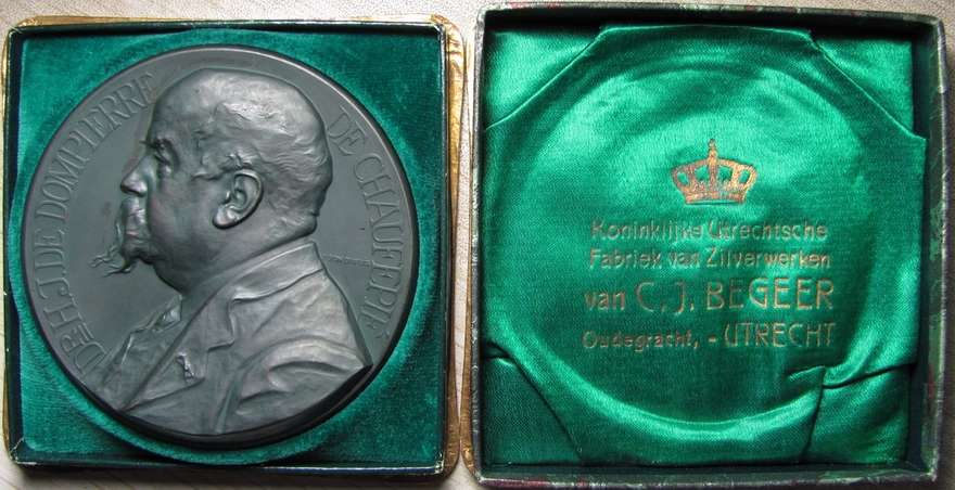 1908 Dr. H.J. de Dompierre Belgium Medal by T. Dupuis
Belgian Association of Friends of the  Medal by Toon Dupuis.   The medal is 68.90 mm in diameter and is made of silver that has been toned in greenish-gray (with a total weight of 4.698 ounces)  The medal has gorgeous even colored surfaces and wonderful details.  It comes in its very beautiful original case of issue. 
