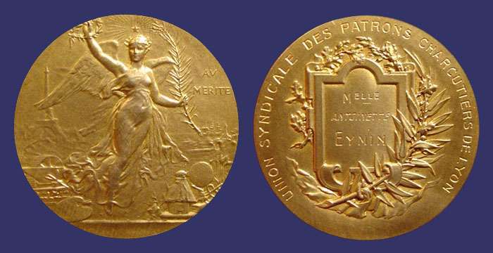 Au Merite
[b]From the collection of John Birks[/b]

Reverse:  UNION SYNDICALE DES PATRONS CHARCUTIERS DE LYON

Awarded to Melle. Antoinette Eymin

Gold-gilted bronze (stamped "BRONZE" with triangle punch on edge)

